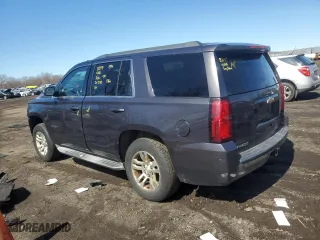 2015 Chevrolet Tahoe LS with VIN 1GNSKAKC2FR252599, listed as a Copart auction lot 48714885 with 140,946 mi miles and Salvage Title. Bid and sale history available at carsss.com. Image 2.