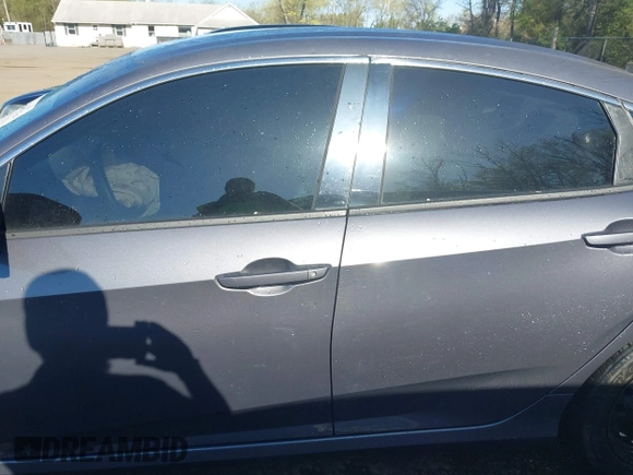 2016 Honda Civic Sedan LX with VIN 2HGFC2F52GH532101, listed as a IAAI auction lot 42009854 with 67,148 mi miles. Bid and sale history available at carsss.com. Image 15.