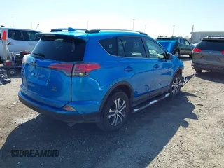 2016 Toyota RAV4 LE with VIN JTMBFREV8GD197535, listed as a IAAI auction lot 41866506 with 81,416 mi miles. Bid and sale history available at carsss.com. Image 4.