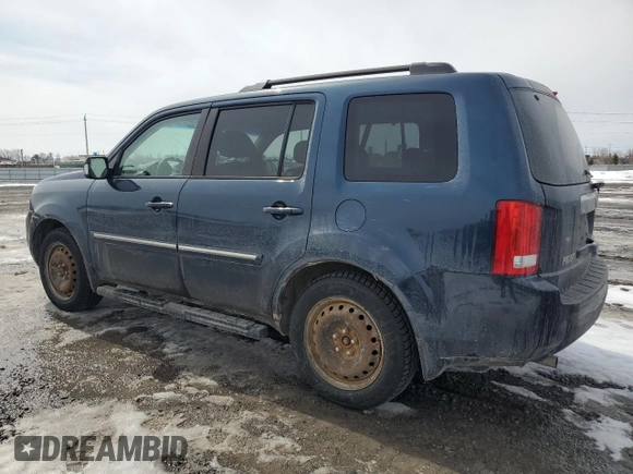 2010 Honda Pilot Touring with VIN 5FNYF4H99AB501127, listed as a Copart auction lot 52602285 with 271,602 mi miles and Salvage Title. Bid and sale history available at carsss.com. Image 2.