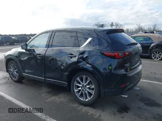 2024 Mazda CX-5 2.5 S Premium Package with VIN JM3KFBDM3R0400333, listed as a IAAI auction lot 41741454 with 14,116 mi miles. Bid and sale history available at carsss.com. Image 6.