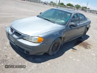 2004 Pontiac Grand Am SE1 with VIN 1G2NF52E84C250525, listed as a IAAI auction lot 42140148 with 156,971 mi miles. Bid and sale history available at carsss.com. Image 2.