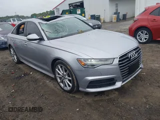 2018 Audi A6 Premium Plus with VIN WAUG8AFC8JN018682, listed as a IAAI auction lot 42351361 with 84,726 mi miles and . Bid and sale history available at DreamBid. Image 1.