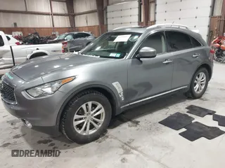 2017 Infiniti QX70 z VIN JN8CS1MU3HM143799, wystawiony jako IAAI lot #41554527 z przebiegiem 70 453 mil mil oraz . Historia ofert i sprzedaży dostępna na DreamBid. Obrazek 17.