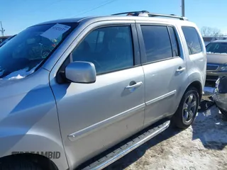 2014 Honda Pilot EX-L with VIN 5FNYF3H78EB006464, listed as a IAAI auction lot 41321137 with 198,496 mi miles and . Bid and sale history available at DreamBid. Image 15.