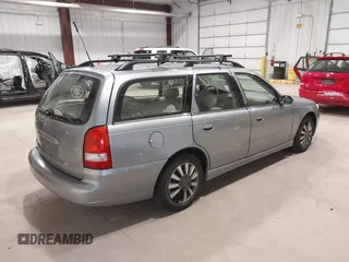 2003 Saturn LW z VIN 1G8JU84F43Y527478, wystawiony jako IAAI lot #42293692 z przebiegiem 146 086 mil mil oraz . Historia ofert i sprzedaży dostępna na DreamBid. Obrazek 4.