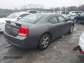 2009 Dodge Charger SXT with VIN 2B3KA33V59H573761, listed as a IAAI auction lot 41545196 with 172,065 mi miles and . Bid and sale history available at carsss.com. Image 4.