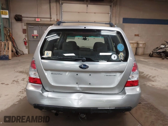 2006 Subaru Forester 2.5 X with VIN JF1SG636X6H712880, listed as a IAAI auction lot 40062211 with 127,537 mi miles. Bid and sale history available at carsss.com. Image 16.