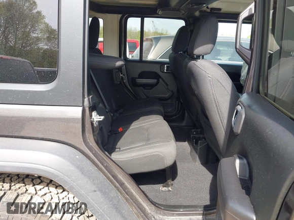 2019 Jeep Wrangler Unlimited Sport S with VIN 1C4HJXDG2KW516571, listed as a IAAI auction lot 42043223 with 58,131 mi miles and . Bid and sale history available at DreamBid. Image 8.