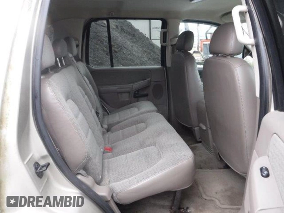 2003 Ford Explorer XLS z VIN 1FMZU72K23ZB43952, wystawiony jako Copart lot #52150285 z przebiegiem 161 828 mil mil oraz Szkody całkowita. Historia ofert i sprzedaży dostępna na DreamBid. Obrazek 10.