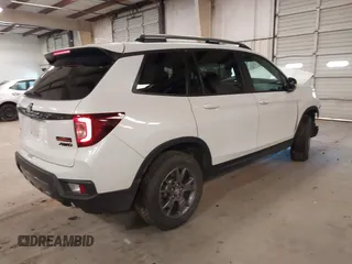 2024 Honda Passport TrailSport with VIN 5FNYF8H62RB011007, listed as a IAAI auction lot 41268349 with Not Provided miles and . Bid and sale history available at DreamBid. Image 4.