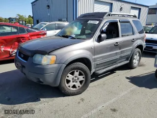 2002 Ford Escape Limited with VIN 1FMCU04122KD65674, listed as a Copart auction lot 56336504 with 199,739 mi miles and Salvage Title. Bid and sale history available at carsss.com. Image 1.