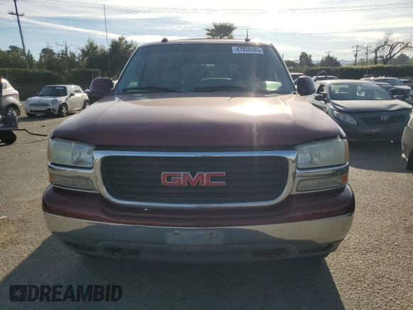 2003 GMC Yukon SLE with VIN 1GKEK13T33J320993, listed as a Copart auction lot 47828485 with 126,912 mi miles and Salvage Title. Bid and sale history available at carsss.com. Image 5.
