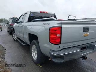 2018 Chevrolet Silverado 1500 LT with VIN 1GCVKREC7JZ151678, listed as a IAAI auction lot 41972011 with 106,892 mi miles and . Bid and sale history available at DreamBid. Image 3.