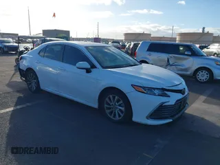 2023 Toyota Camry LE z VIN 4T1C11AKXPU167075, wystawiony jako IAAI lot #41379890 z przebiegiem 37 818 mil mil oraz . Historia ofert i sprzedaży dostępna na DreamBid. Obrazek 1.