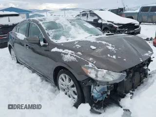 2016 Mazda Mazda6 i Touring with VIN JM1GJ1V58G1458699, listed as a IAAI auction lot 41598598 with 73,576 mi miles. Bid and sale history available at carsss.com. Image 1.