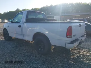 1998 Ford F-150 with VIN 1FTZF1728WNC10750, listed as a IAAI auction lot 42036177 with 237,434 mi miles and . Bid and sale history available at DreamBid. Image 3.