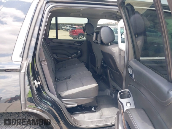 2015 Chevrolet Tahoe with VIN 1GNSK2KC4FR610534, listed as a IAAI auction lot 42357319 with 140,479 mi miles and . Bid and sale history available at DreamBid. Image 8.