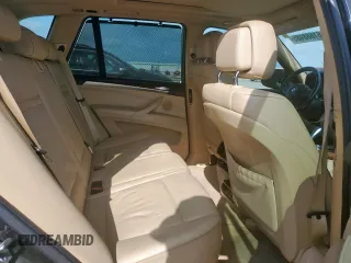 2012 BMW X5 35i с VIN 5UXZV4C52CL988794, выставлен на аукционе Copart как лот 61688485 с пробегом Не указан миль и Чистый • Clean title. История ставок и продаж доступна на DreamBid. Изображение 10.