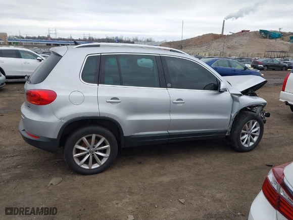 2017 Volkswagen Tiguan Wolfsburg Edition with VIN WVGSV7AX8HK031345, listed as a IAAI auction lot 41348567 with 130,313 mi miles. Bid and sale history available at carsss.com. Image 13.