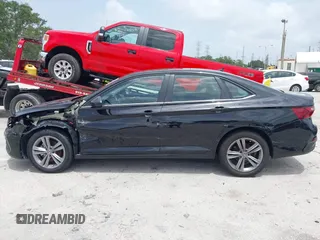2023 Volkswagen Jetta SE with VIN 3VW7M7BU3PM037141, listed as a IAAI auction lot 42446046 with 21,149 mi miles and . Bid and sale history available at DreamBid. Image 14.