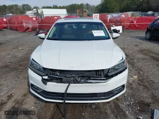 2016 Volkswagen Passat 1.8T SEL with VIN 1VWCT7A39GC057485, listed as a IAAI auction lot 41797043 with 82,632 mi miles. Bid and sale history available at carsss.com. Image 12.