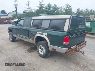 1999 Dodge Dakota SLT z VIN 1B7GG22X0XS104969, wystawiony jako IAAI lot #42493470 z przebiegiem 160 019 mil mil oraz . Historia ofert i sprzedaży dostępna na DreamBid. Obrazek 3.