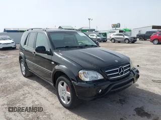 2001 Mercedes-Benz M-Class AMG with VIN 4JGAB74E51A272841, listed as a IAAI auction lot 41734340 with 168,387 mi miles. Bid and sale history available at carsss.com. Image 1.