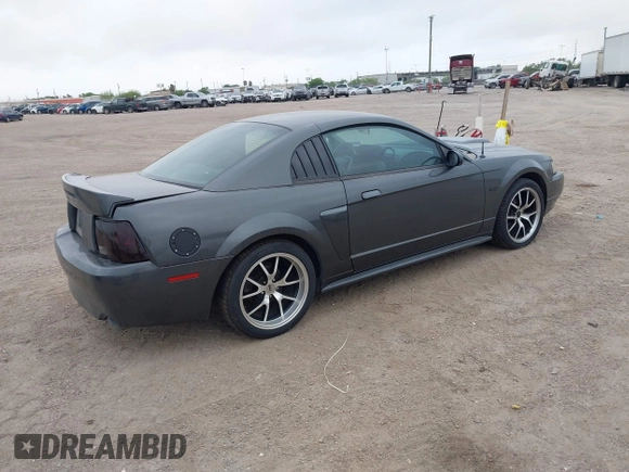 2004 Ford Mustang GT Deluxe with VIN 1FAFP42X74F115520, listed as a IAAI auction lot 41842751 with 179,665 mi miles and . Bid and sale history available at DreamBid. Image 4.