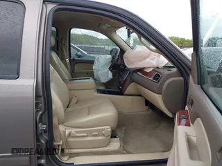 2013 Chevrolet Tahoe LT with VIN 1GNSCBE0XDR357490, listed as a IAAI auction lot 42013034 with Not provided miles and . Bid and sale history available at DreamBid. Image 5.