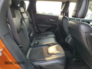 2015 Jeep Cherokee Trailhawk with VIN 1C4PJMBS0FW675807, listed as a Copart auction lot 58800615 with 109,019 mi miles and Salvage title. Bid and sale history available at DreamBid. Image 11.