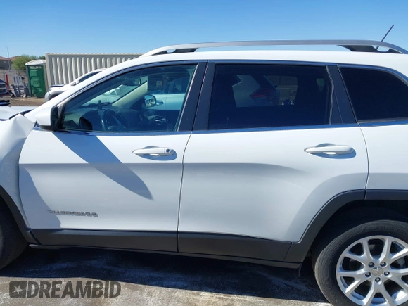 2016 Jeep Cherokee Altitude with VIN 1C4PJLCB6GW200348, listed as a IAAI auction lot 40791569 with 95,600 mi miles. Bid and sale history available at carsss.com. Image 14.