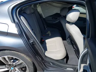 2012 BMW 3 Series 328i with VIN WBA3A5C59CF345198, listed as a IAAI auction lot 41753828 with 135,726 mi miles. Bid and sale history available at carsss.com. Image 8.