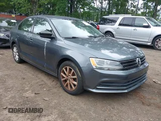 2015 Volkswagen Jetta SE z VIN 3VWD17AJ5FM285988, wystawiony jako IAAI lot #42675179 z przebiegiem 150 815 mil mil oraz . Historia ofert i sprzedaży dostępna na DreamBid. Obrazek 1.