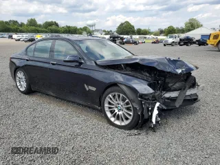 2015 BMW 7 Series 750i xDrive with VIN WBAYB6C58FD966084, listed as a Copart auction lot 61875325 with 159,616 mi miles and Salvage title. Bid and sale history available at DreamBid. Image 4.