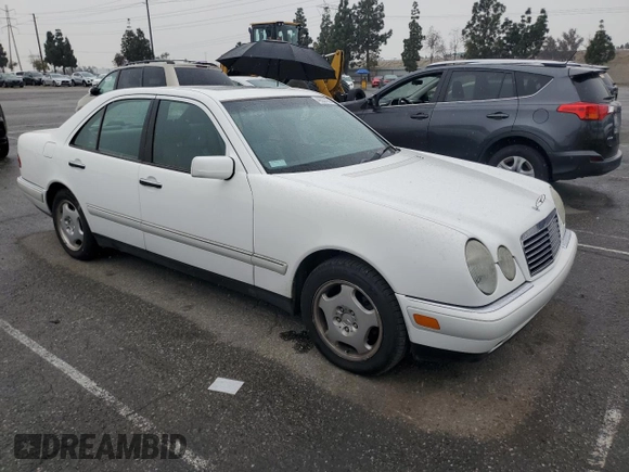 1997 Mercedes-Benz E-Class with VIN WDBJF72F2VA099305, listed as a Copart auction lot 48007935 with 96,410 mi miles and Salvage Title. Bid and sale history available at carsss.com. Image 4.