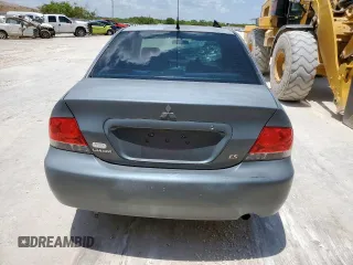 2006 Mitsubishi Lancer ES z VIN JA3AJ26EX6U067642, wystawiony jako Copart lot #56035945 z przebiegiem 163 060 mil mil oraz Szkoda całkowita • Salvage title. Historia ofert i sprzedaży dostępna na DreamBid. Obrazek 6.