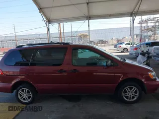 2002 Toyota Sienna LE with VIN 4T3ZF13C02U473719, listed as a IAAI auction lot 42272685 with 301,288 mi miles and . Bid and sale history available at DreamBid. Image 13.