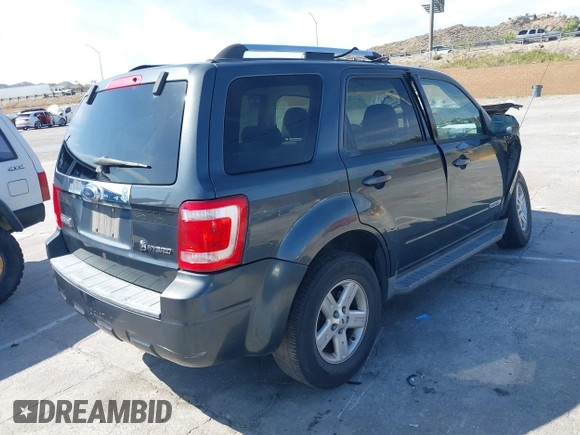 2008 Ford Escape Hybrid with VIN 1FMCU49H58KE79125, listed as a IAAI auction lot 42157559 with 197,964 mi miles and . Bid and sale history available at DreamBid. Image 4.