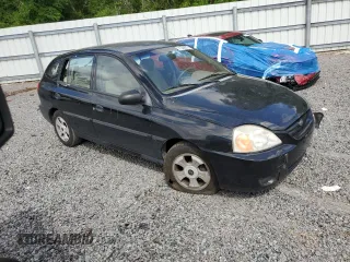 2003 Kia Rio with VIN KNADC165036169340, listed as a Copart auction lot 51538975 with 136,054 mi miles and Salvage Title. Bid and sale history available at carsss.com. Image 4.