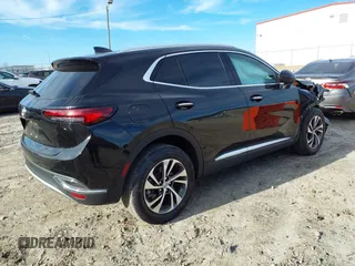 2023 Buick Envision Essence with VIN LRBFZNR47PD026728, listed as a IAAI auction lot 41651439 with 28,179 mi miles. Bid and sale history available at carsss.com. Image 4.