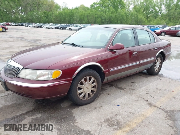 2000 Lincoln Continental with VIN 1LNHM97V5YY845447, listed as a IAAI auction lot 42077417 with 83,655 mi miles. Bid and sale history available at carsss.com. Image 2.