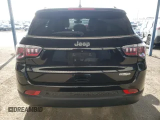 2019 Jeep Compass Latitude with VIN 3C4NJCBB1KT750032, listed as a Copart auction lot 82931994 with 59,293 mi miles and Salvage Title. Bid and sale history available at DreamBid. Image 6.
