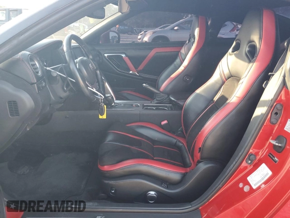 2010 Nissan GT-R Premium z VIN JN1AR5EF0AM230171, wystawiony jako Copart lot #66912074 z przebiegiem Nie podano mil oraz Szkody całkowita. Historia ofert i sprzedaży dostępna na DreamBid. Obrazek 7.
