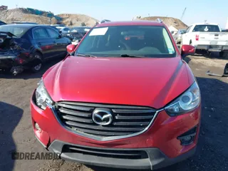 2016 Mazda CX-5 Touring with VIN JM3KE4CY0G0901356, listed as a IAAI auction lot 41641742 with 96,950 mi miles. Bid and sale history available at carsss.com. Image 12.