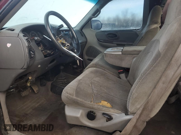 1999 Ford F-150 с VIN 2FTRX18W5XCA04548, выставлен на аукционе Copart как лот 41735485 с пробегом Не указан миль и Списание • Salvage title. История ставок и продаж доступна на DreamBid. Изображение 7.