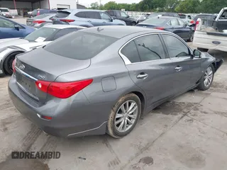 2015 Infiniti Q50 Premium z VIN JN1BV7AR7FM408015, wystawiony jako IAAI lot #42083301 z przebiegiem 58 817 mil mil oraz . Historia ofert i sprzedaży dostępna na DreamBid. Obrazek 4.
