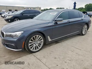 2018 BMW 7 Series 740i z VIN WBA7E2C50JG741970, wystawiony jako Copart lot #56480695 z przebiegiem 53 740 mil mil oraz Szkoda całkowita • Salvage title. Historia ofert i sprzedaży dostępna na DreamBid. Obrazek 1.