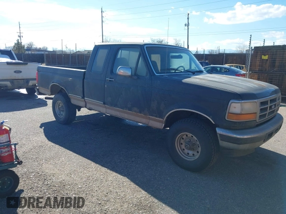 1996 Ford F-150 with VIN 1FTEX14N0TKA41914, listed as a IAAI auction lot 41724340 with 158,652 mi miles. Bid and sale history available at carsss.com. Image 1.