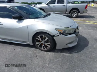 2016 Nissan Maxima SL with VIN 1N4AA6AP0GC433932, listed as a IAAI auction lot 41897180 with 91,871 mi miles and . Bid and sale history available at DreamBid. Image 19.